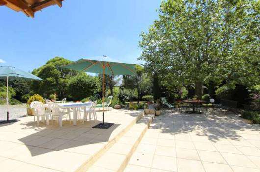 Nestling in nearly 3 acres of glorious landscaped gardens with fruit trees,