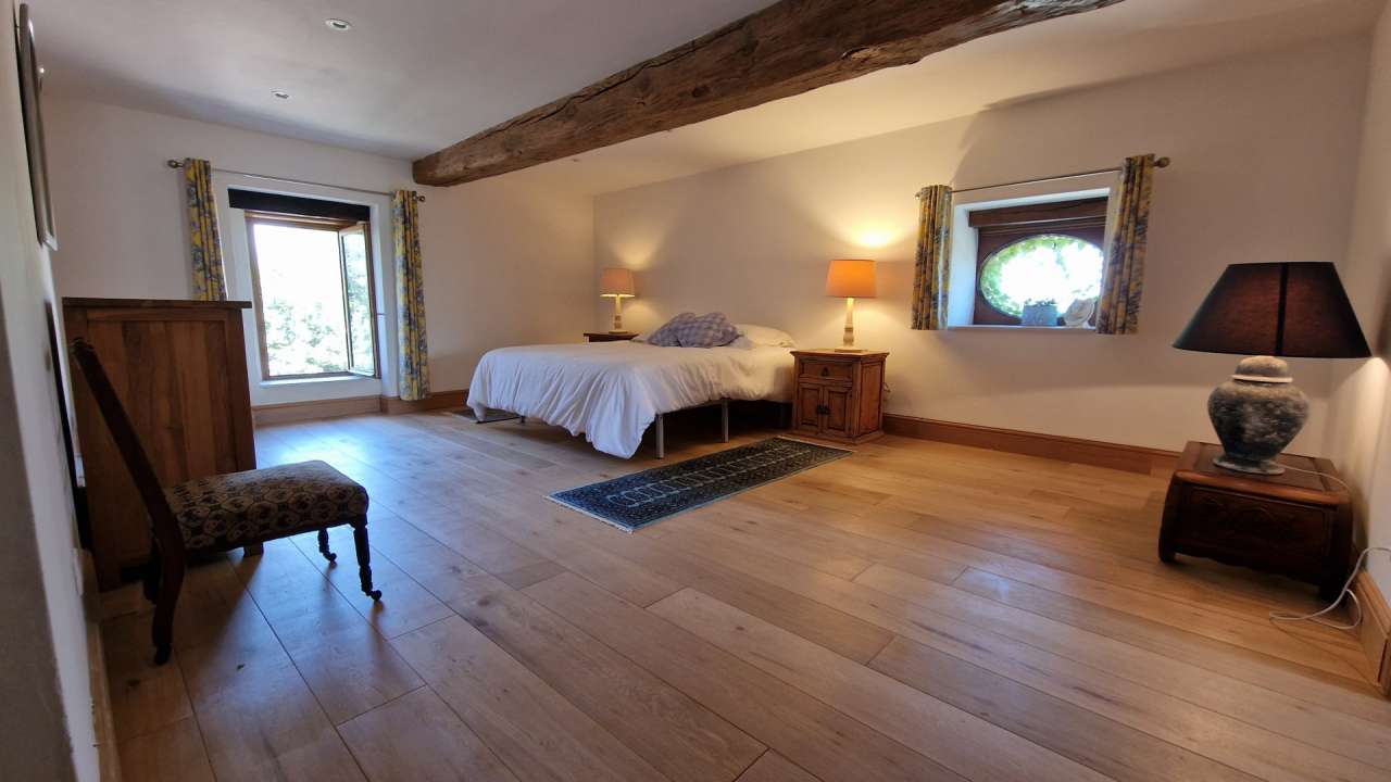 Nestling in nearly 22 acres of glorious landscaped gardens with expansive p