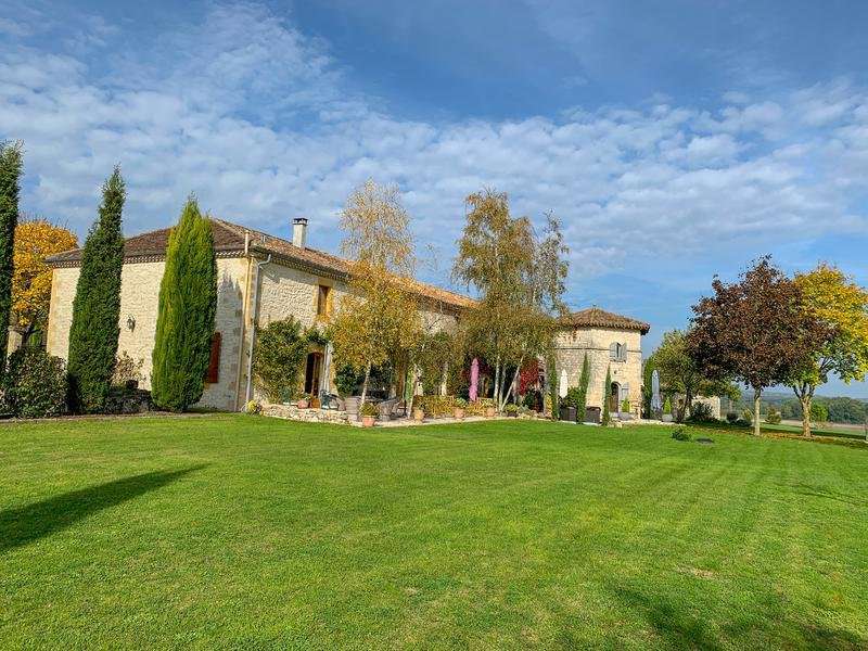 Nestling in nearly 22 acres of glorious landscaped gardens with expansive p