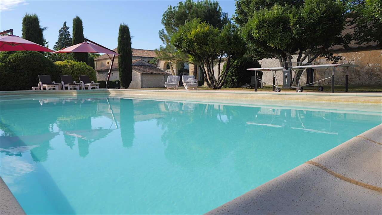 Nestling in nearly 22 acres of glorious landscaped gardens with expansive p