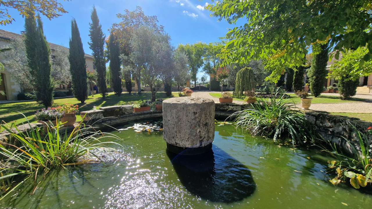 Nestling in nearly 22 acres of glorious landscaped gardens with expansive p