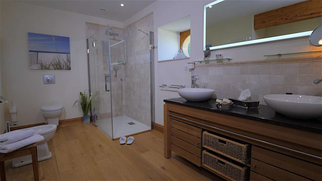 Nestling in nearly 22 acres of glorious landscaped gardens with expansive p