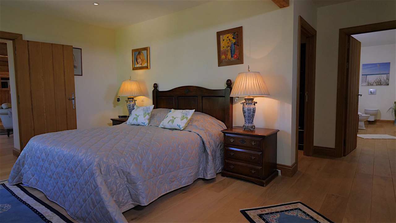 Nestling in nearly 22 acres of glorious landscaped gardens with expansive p