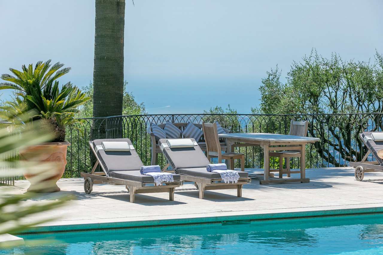 Surrounded by 17,720m2 of mature gardens and ideally located in one of the