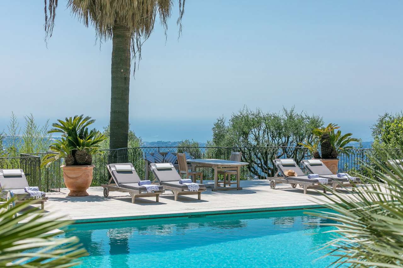 Surrounded by 17,720m2 of mature gardens and ideally located in one of the