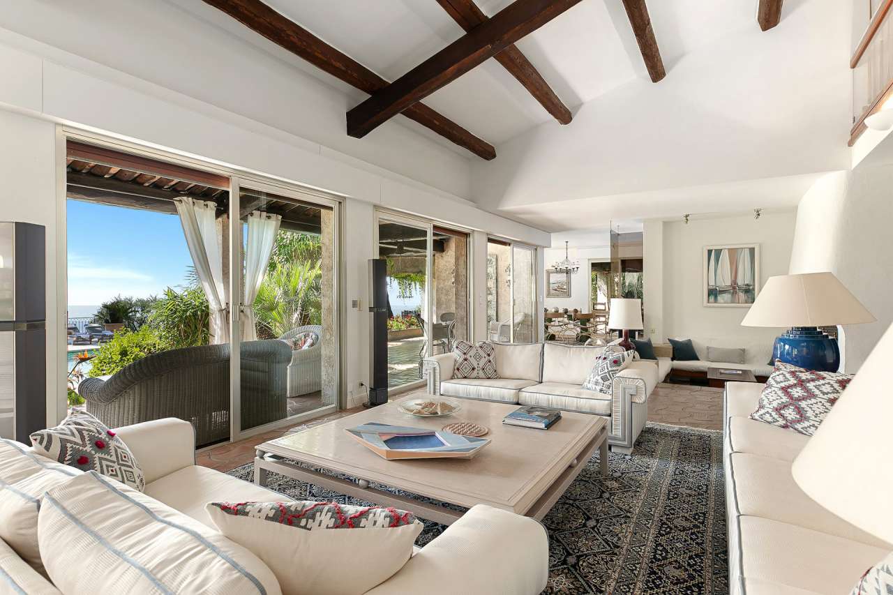 Surrounded by 17,720m2 of mature gardens and ideally located in one of the