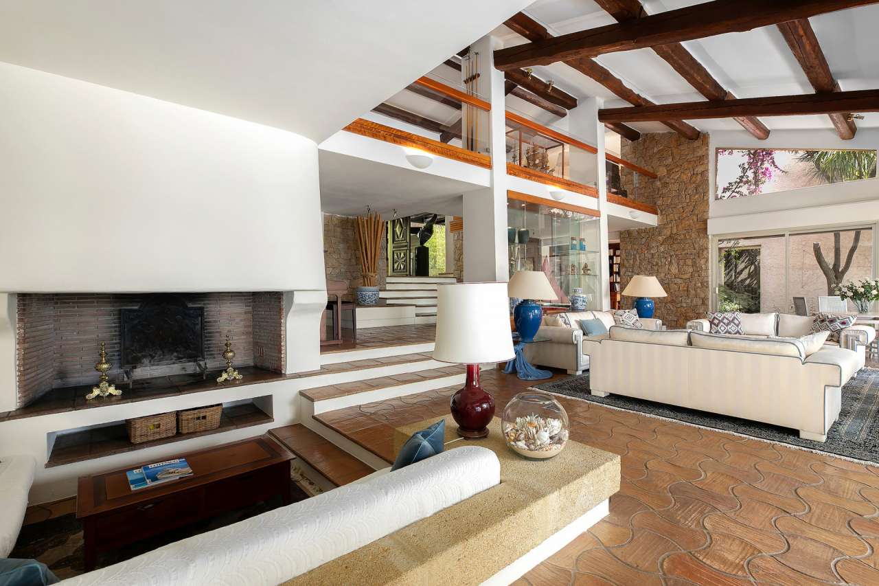 Surrounded by 17,720m2 of mature gardens and ideally located in one of the