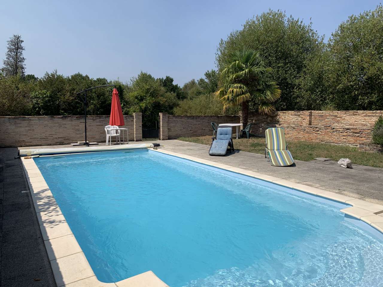 Beautiful character rural property with swimming pool and set in over 10 ac