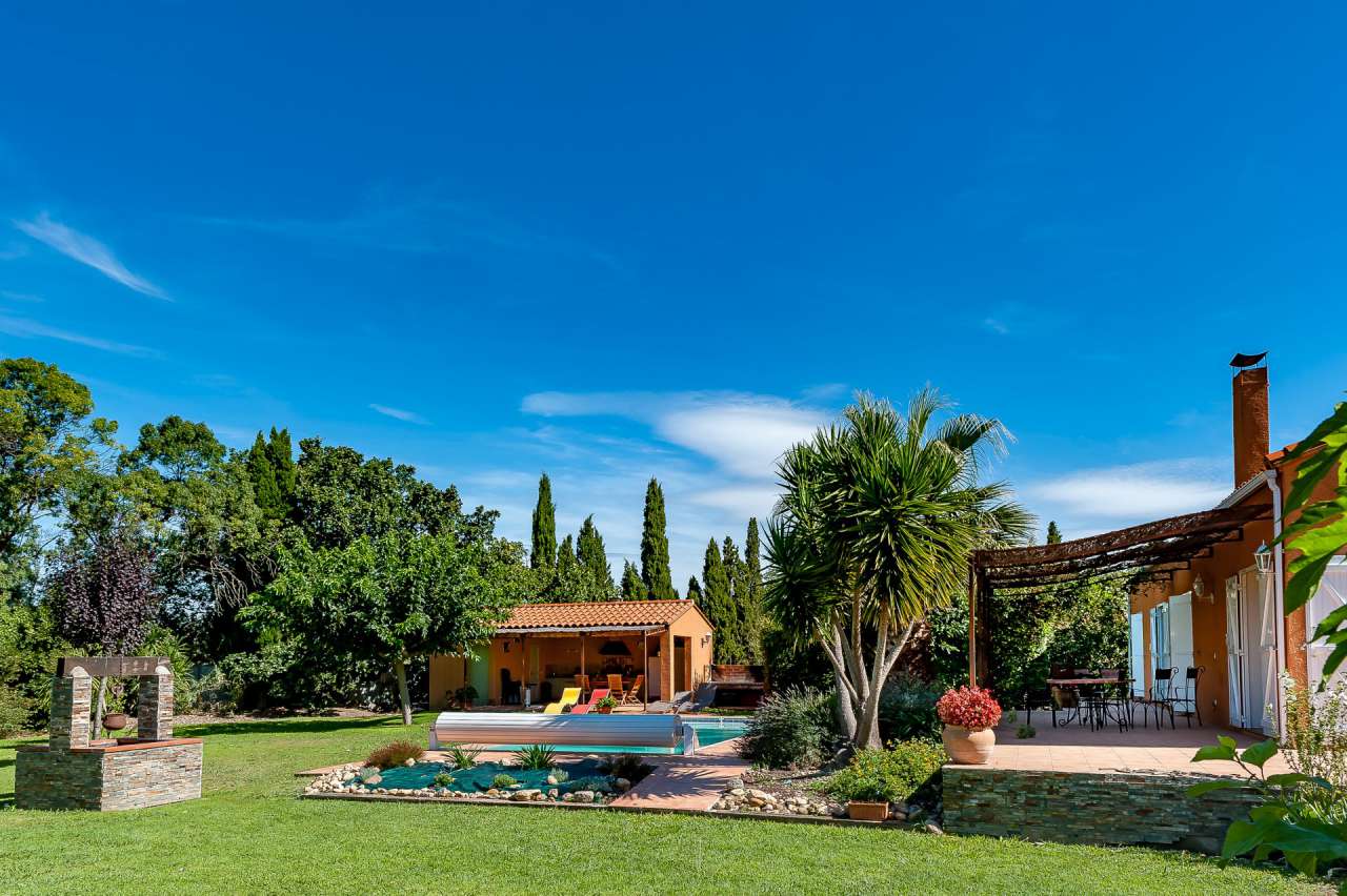 Lovely 4 bedroom home set within lush landscaped gardens of 2,376m2 with a