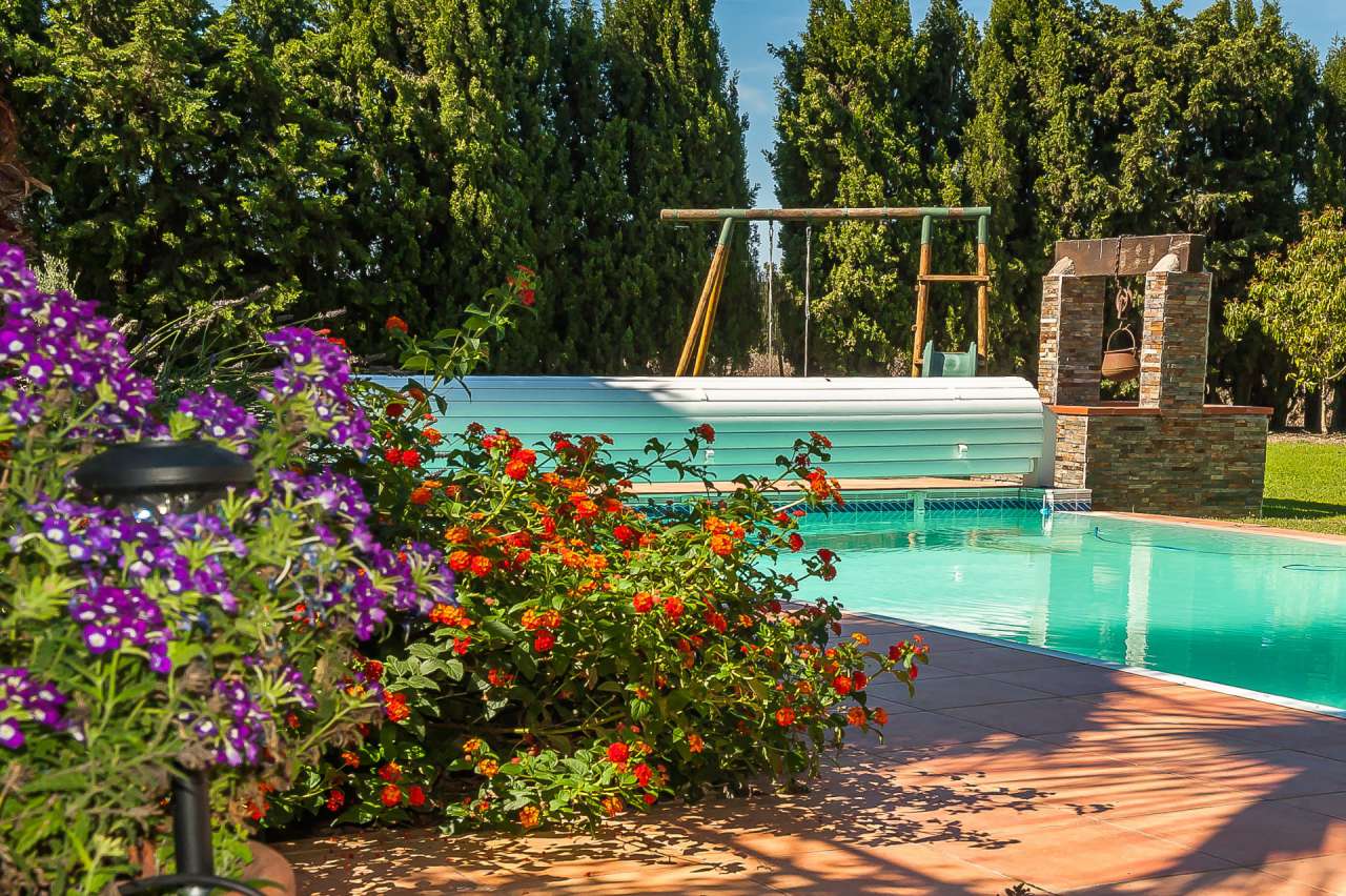 Lovely 4 bedroom home set within lush landscaped gardens of 2,376m2 with a