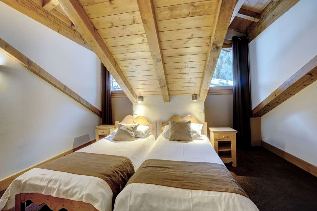 Enjoying wonderful mountain views from its top floor position, is this styl