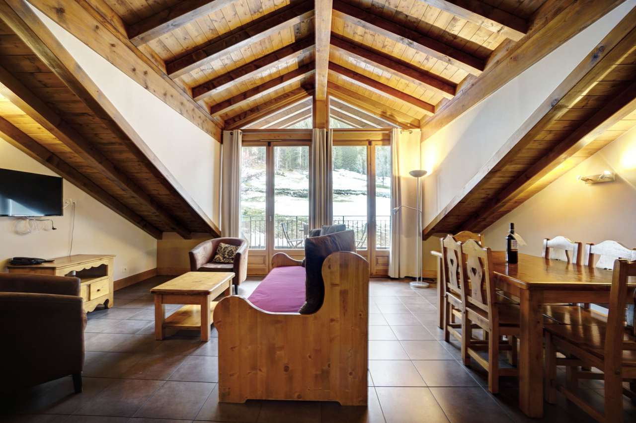 Enjoying wonderful mountain views from its top floor position, is this styl