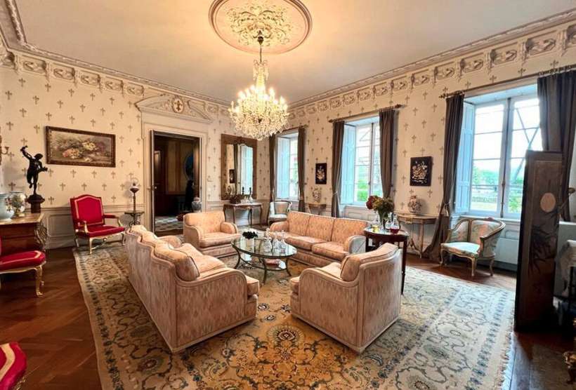 Nestling in 1.9 hectares of glorious land is this beautifully renovated 12