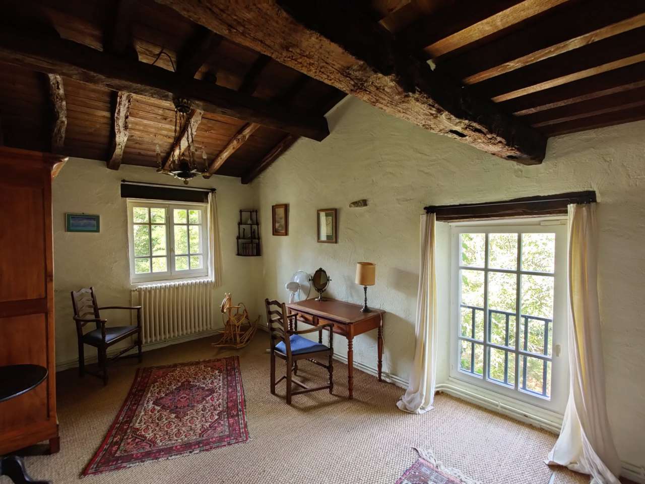 Nestling in over 9.5 acres of glorious land with outbuildings, gardens and