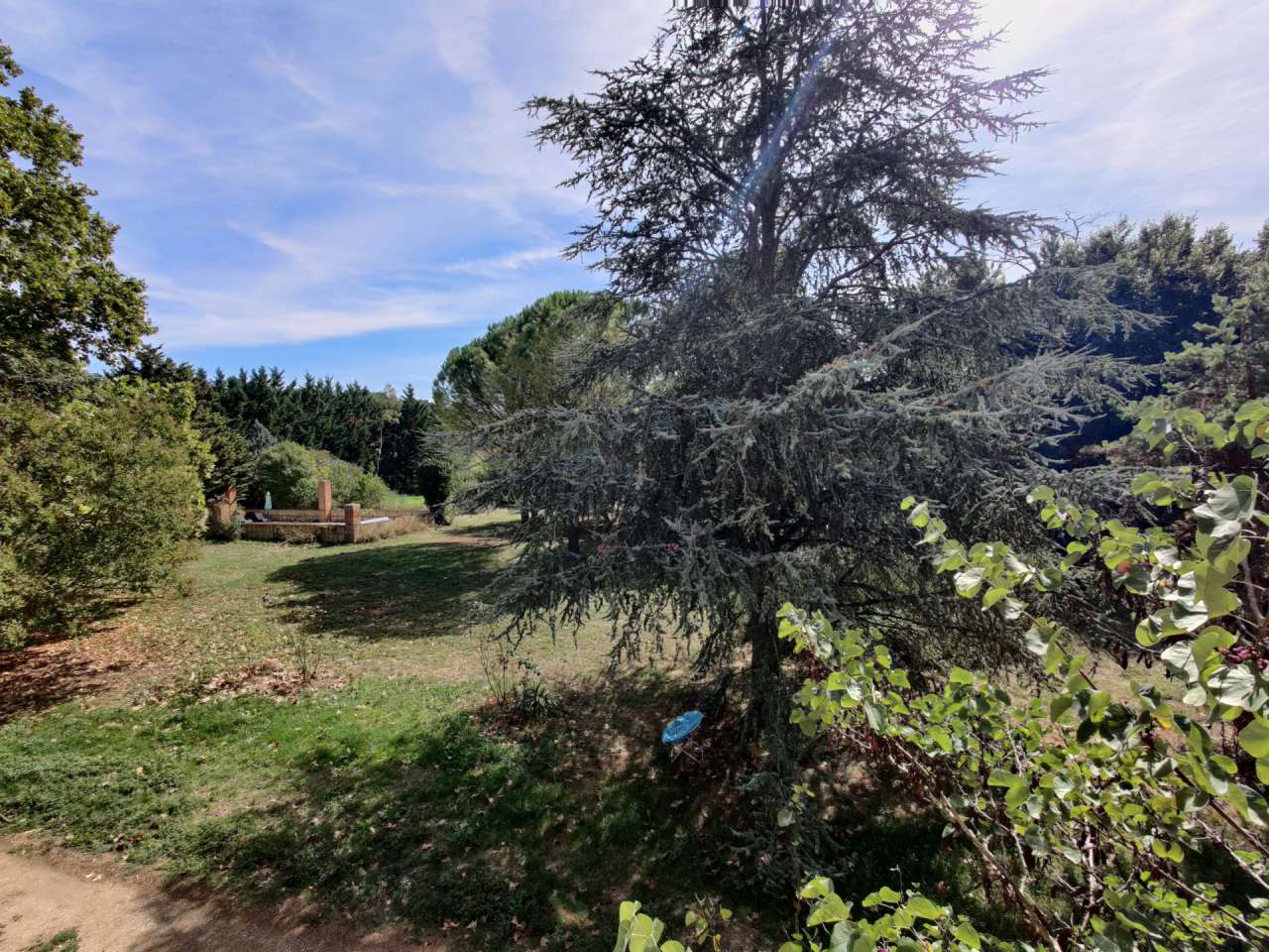 Nestling in over 9.5 acres of glorious land with outbuildings, gardens and