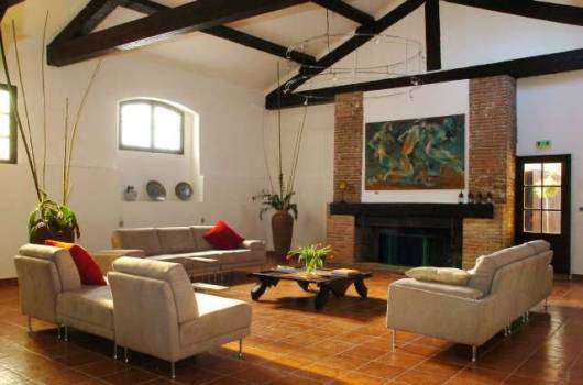 Nestling in 6.3 acres of glorious land with expansive pool, is this charmin