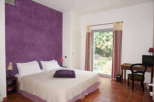 Nestling in 6.3 acres of glorious land with expansive pool, is this charmin