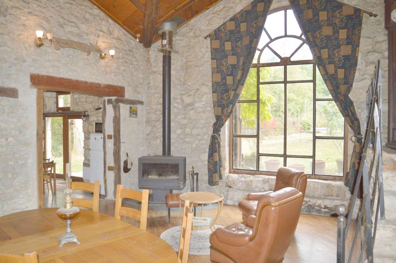 Surrounded by nature and full of character and charm, this magnificent 5 be