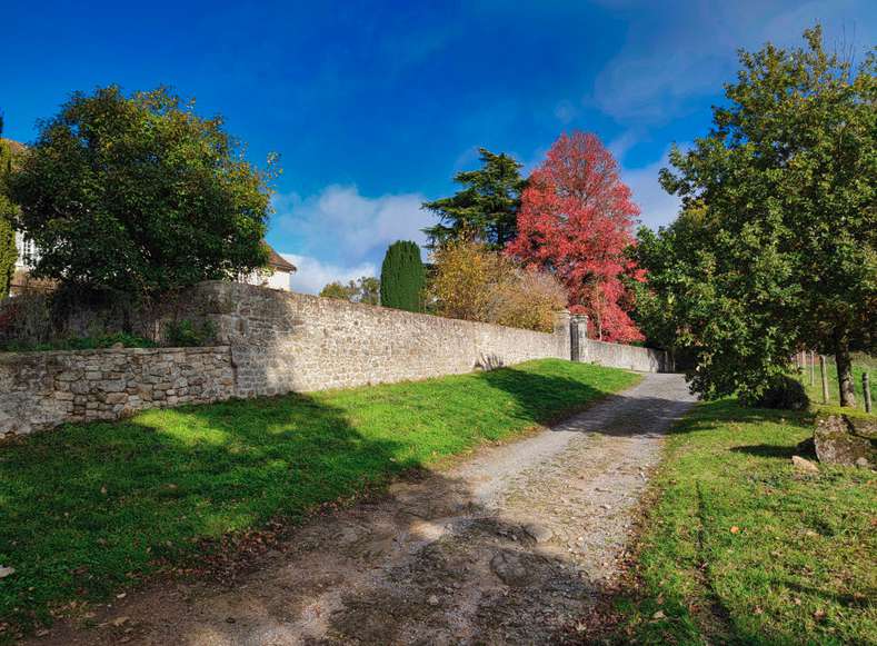 Nestling in 20 acres of glorious land with beautiful gardens, tennis court