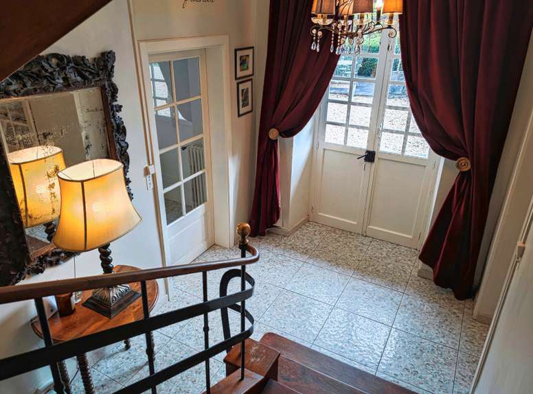 Nestling in 20 acres of glorious land with beautiful gardens, tennis court