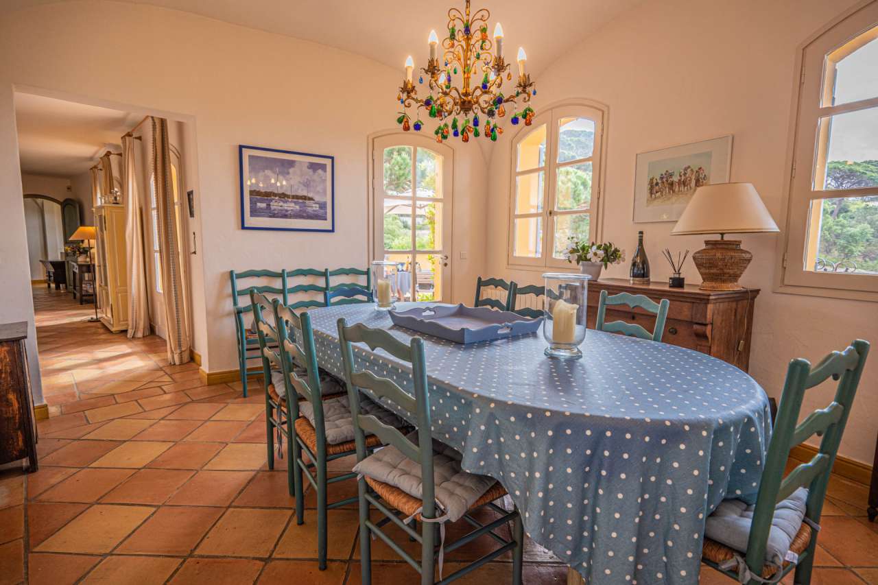 Nestling in beautiful landscaped gardens with expansive pool, is this outst