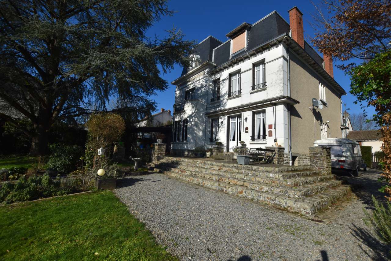 Tastefully renovated 3 storey, 8 bedroom house with beautiful enclosed gard