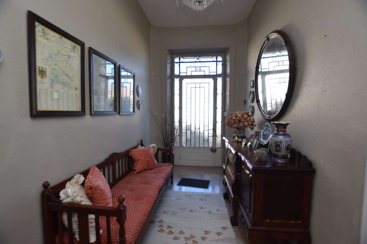 Tastefully renovated 3 storey, 8 bedroom house with beautiful enclosed gard