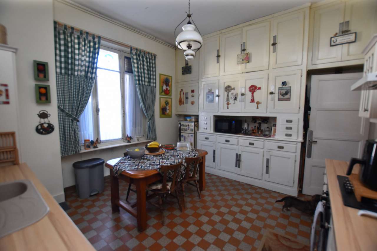 Tastefully renovated 3 storey, 8 bedroom house with beautiful enclosed gard