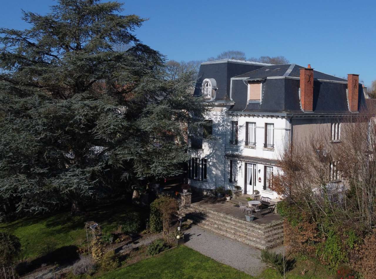 Tastefully renovated 3 storey, 8 bedroom house with beautiful enclosed gard