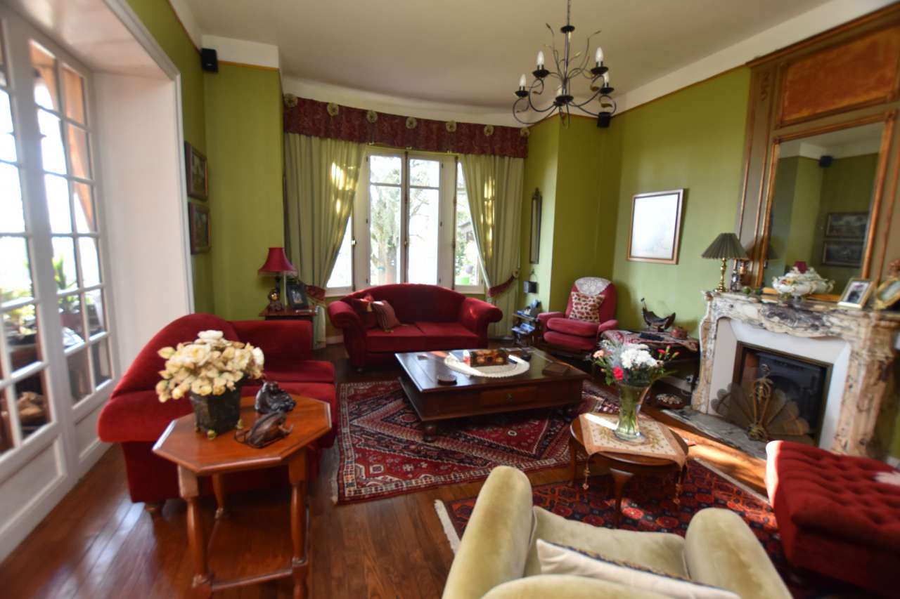 Tastefully renovated 3 storey, 8 bedroom house with beautiful enclosed gard