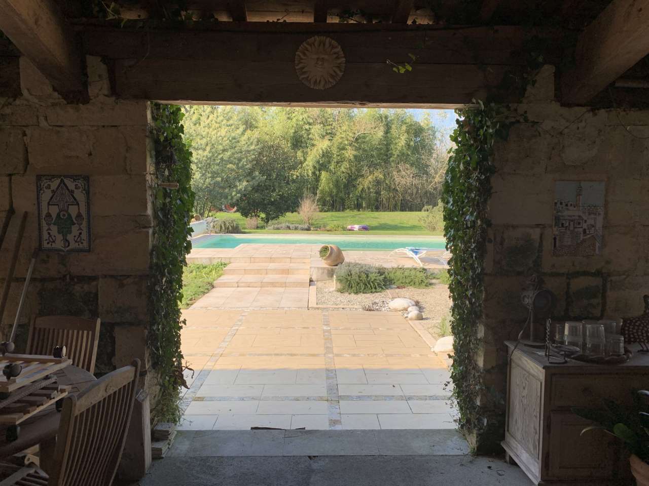 Nestling in over 9 acres of glorious landscaped gardens with expansive pool