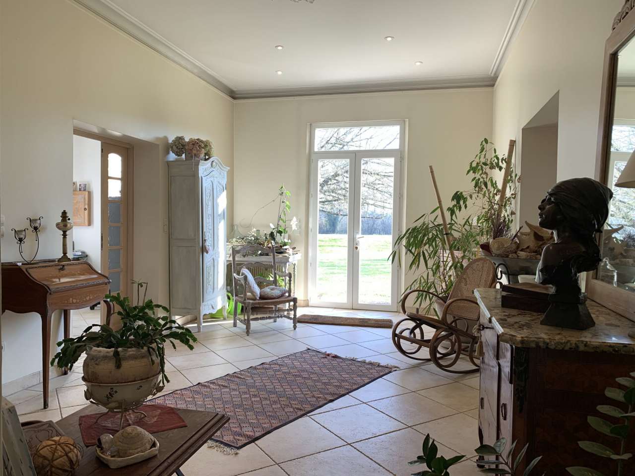 Nestling in over 9 acres of glorious landscaped gardens with expansive pool