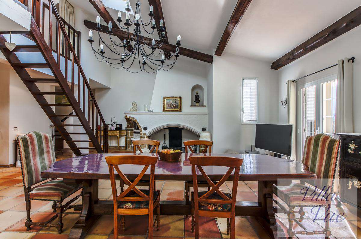 Nestling in half an acre of beautiful wooded gardens with pool, is this cha