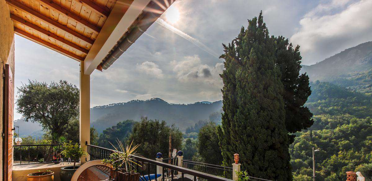 Nestling in half an acre of beautiful wooded gardens with pool, is this cha