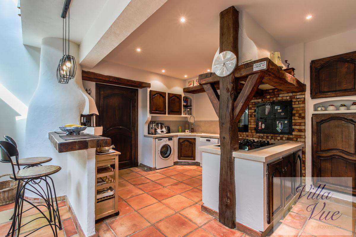 Nestling in half an acre of beautiful wooded gardens with pool, is this cha