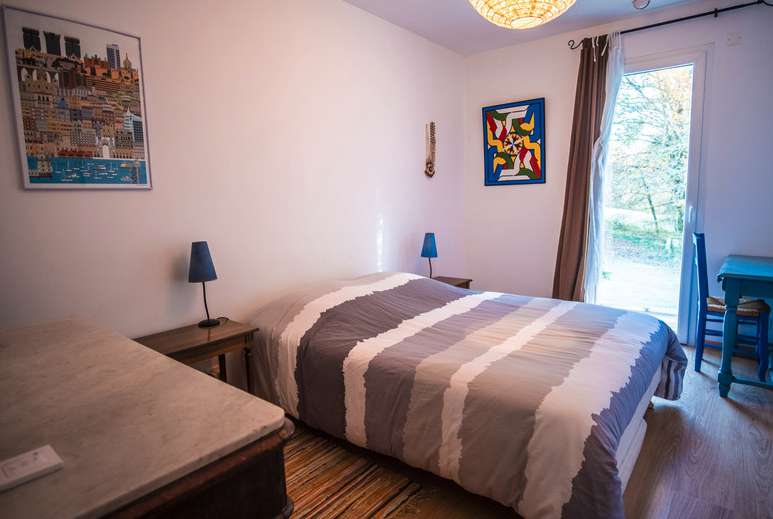 Nestling in over an acre of mature landscaped gardens, is this unique archi