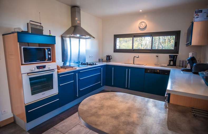 Nestling in over an acre of mature landscaped gardens, is this unique archi