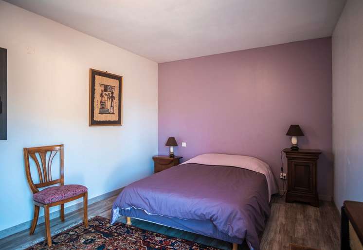 Nestling in over an acre of mature landscaped gardens, is this unique archi