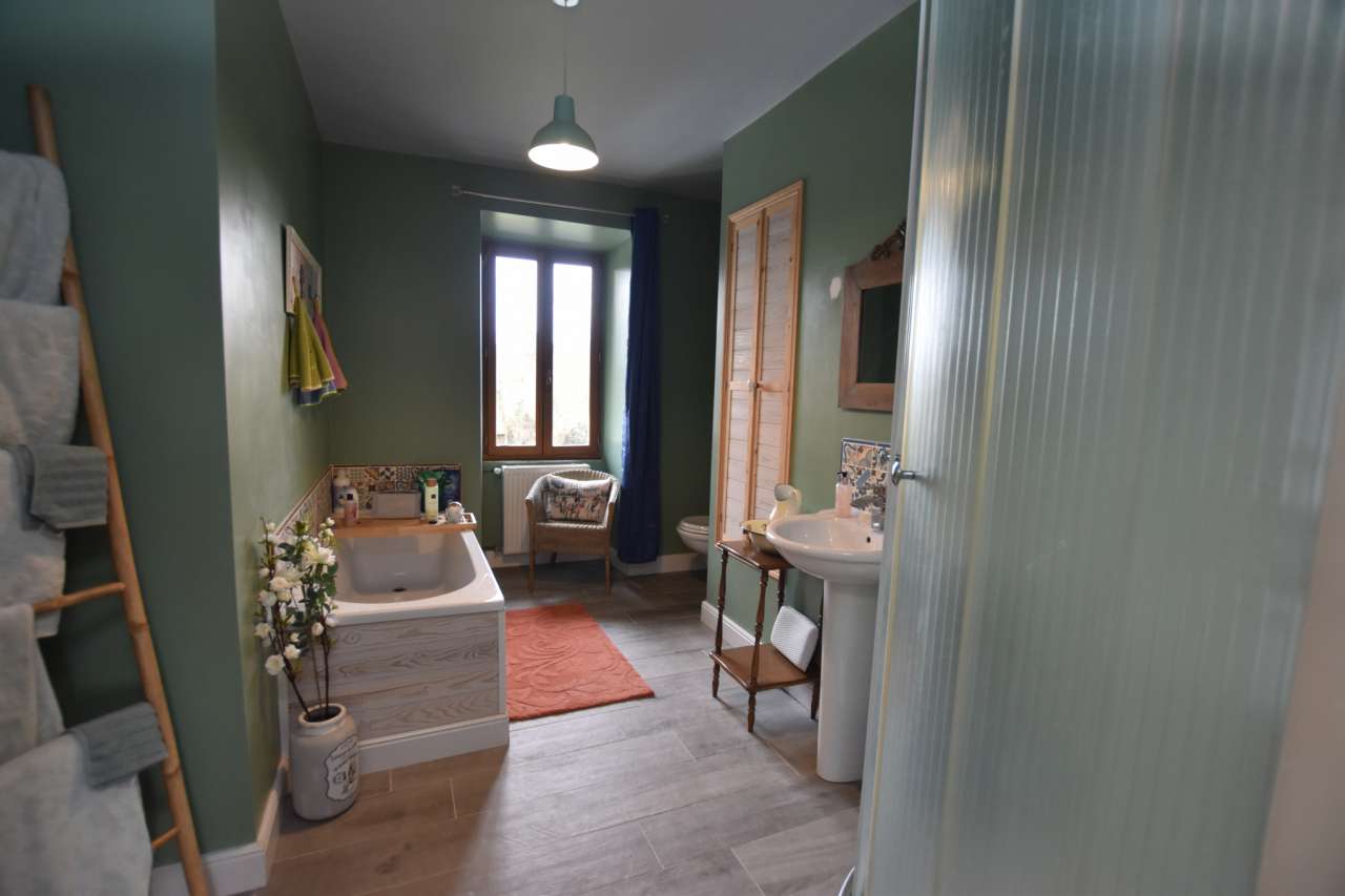 Nestling in over an acre of glorious land with gardens and plunge pool, is