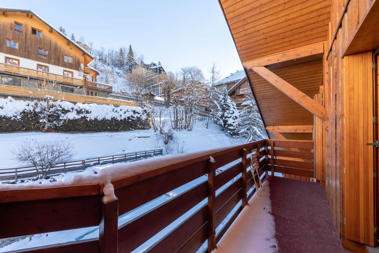 Stylish duplex apartment in the heart of Meribel with clear views from its