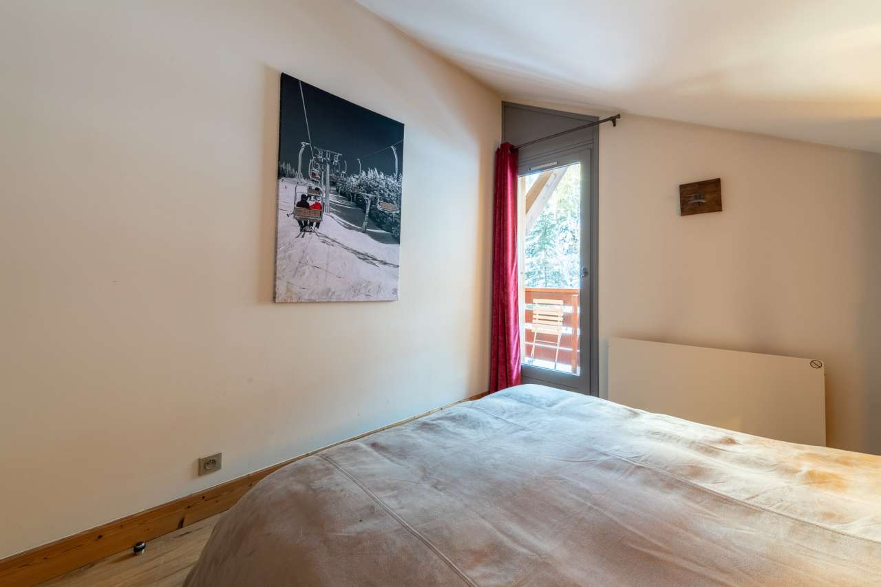 Stylish duplex apartment in the heart of Meribel with clear views from its