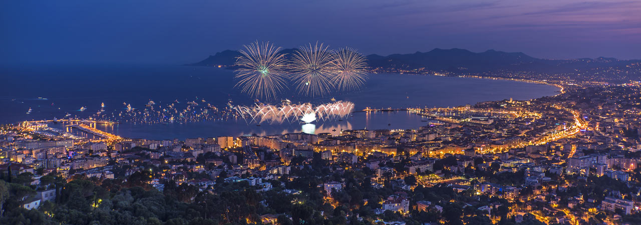 Cannes, overlooking the harbour at night with fireworks near Prestige Property